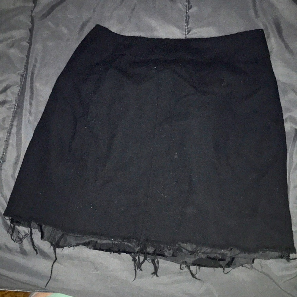 Black skirt plaid skirt and pink skirt